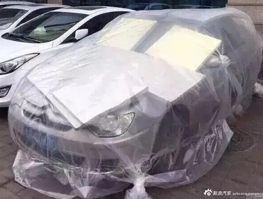 北京车主应对冰雹奇招迭出，棉被纸箱齐上阵，共度雨中冰雹劫